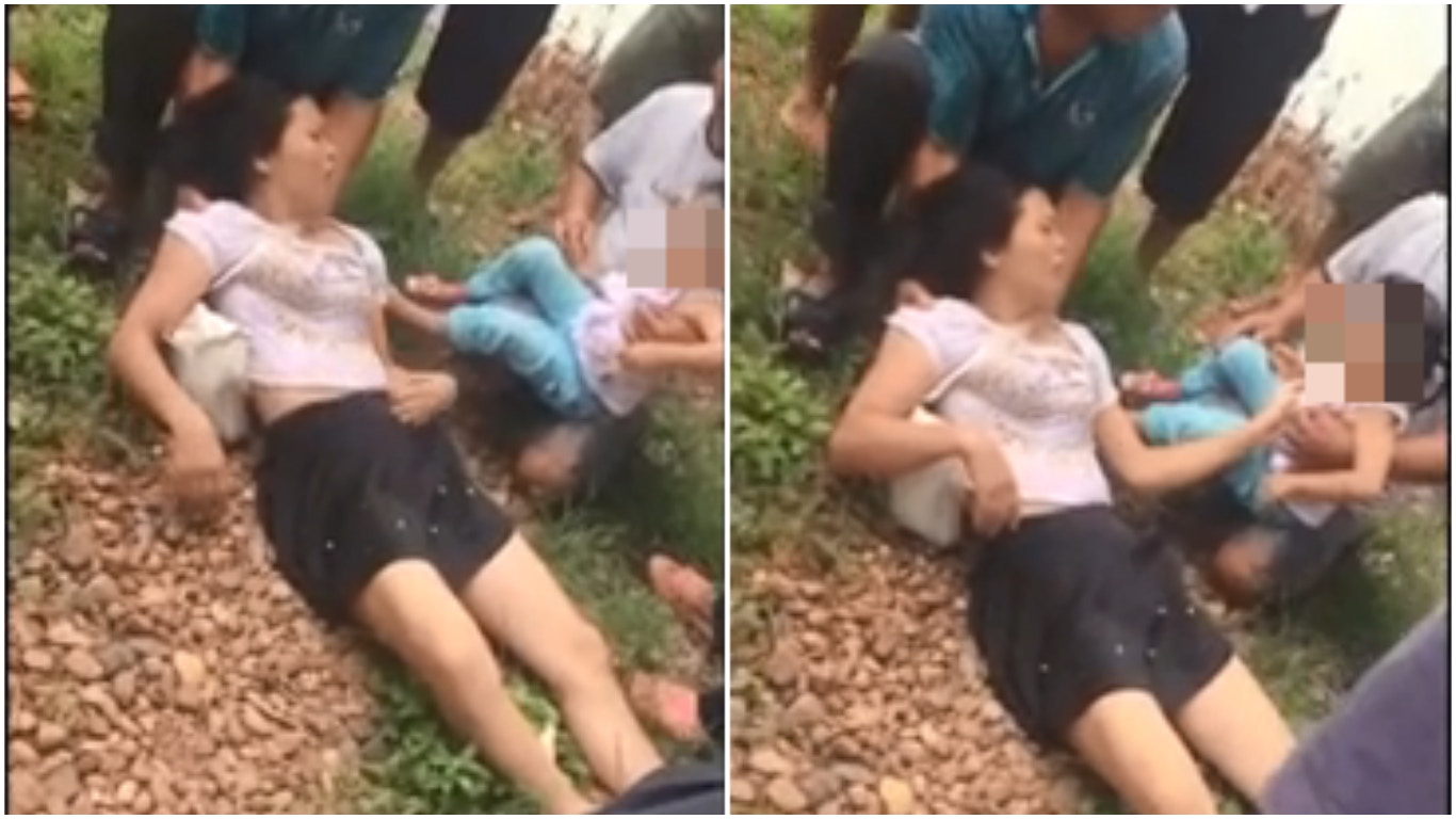女子投江後被救起，還伸手撫摸女兒。（資料圖片）