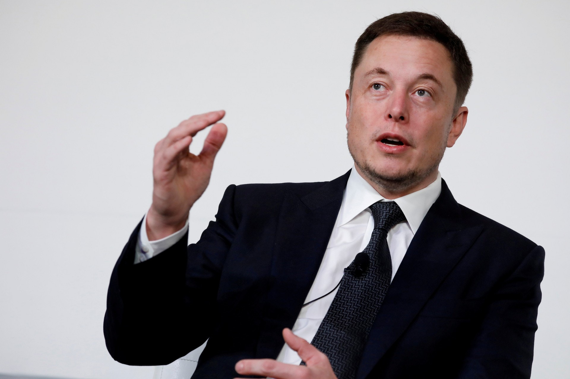 馬斯克8月7日表示有意私有化Tesla，令公司股價一度升至停牌，復牌後收市升11%。（路透社）