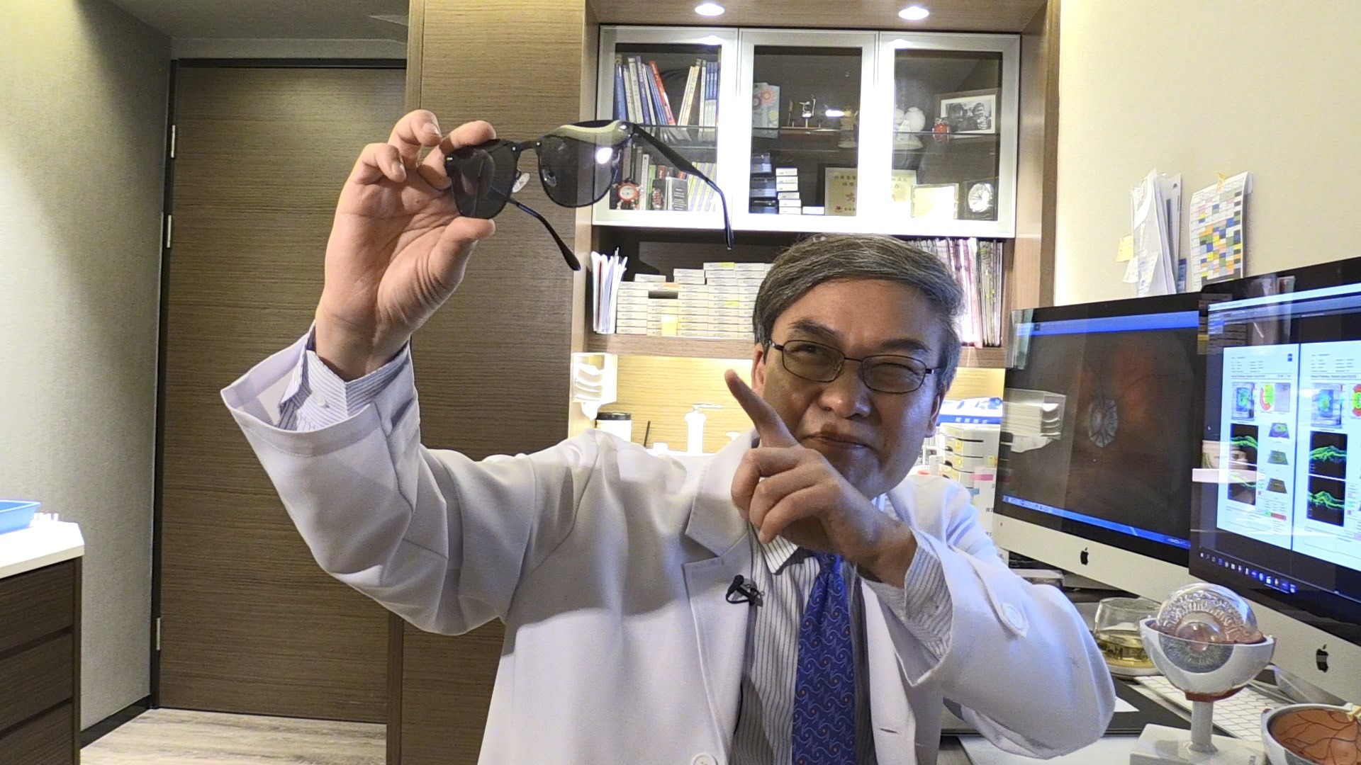 林順潮醫生認為灰色、棕色和綠色的太陽眼鏡鏡片都是比較有效隔濾紫外線,灰色更特別能讓光線顏色均勻穿透入鏡,並保留到視像原色。(溫嘉敏攝)