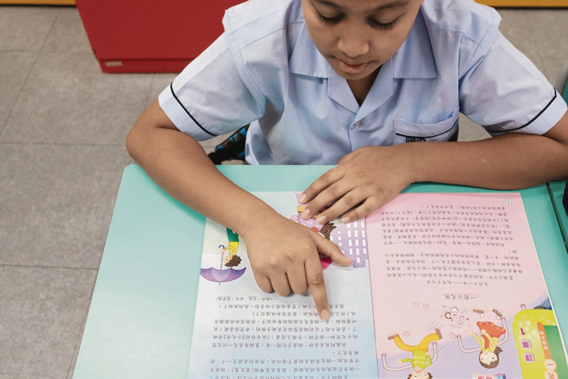 不少非華語學生在香港土生土長,從小在本地學校讀書、學習中文。(高仲明攝) 不少非華語學生在香港土生土長,從小在本地學校讀書、學習中文。(高仲明攝)