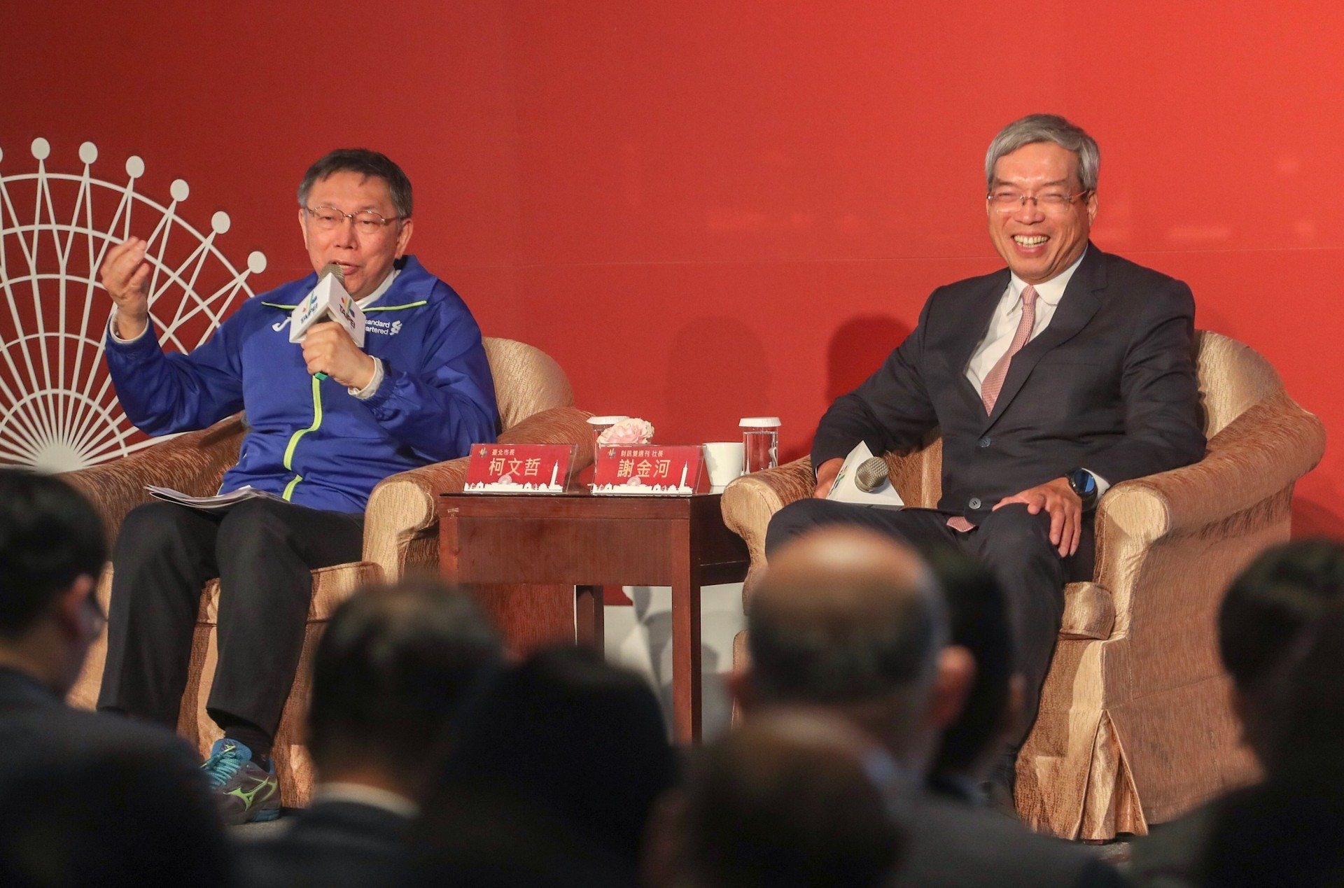 柯文哲出席對談指出，台灣未來定位只要從「國家」兩個字就可解決：「國就是中華民國，家就是台灣」。（中央社）