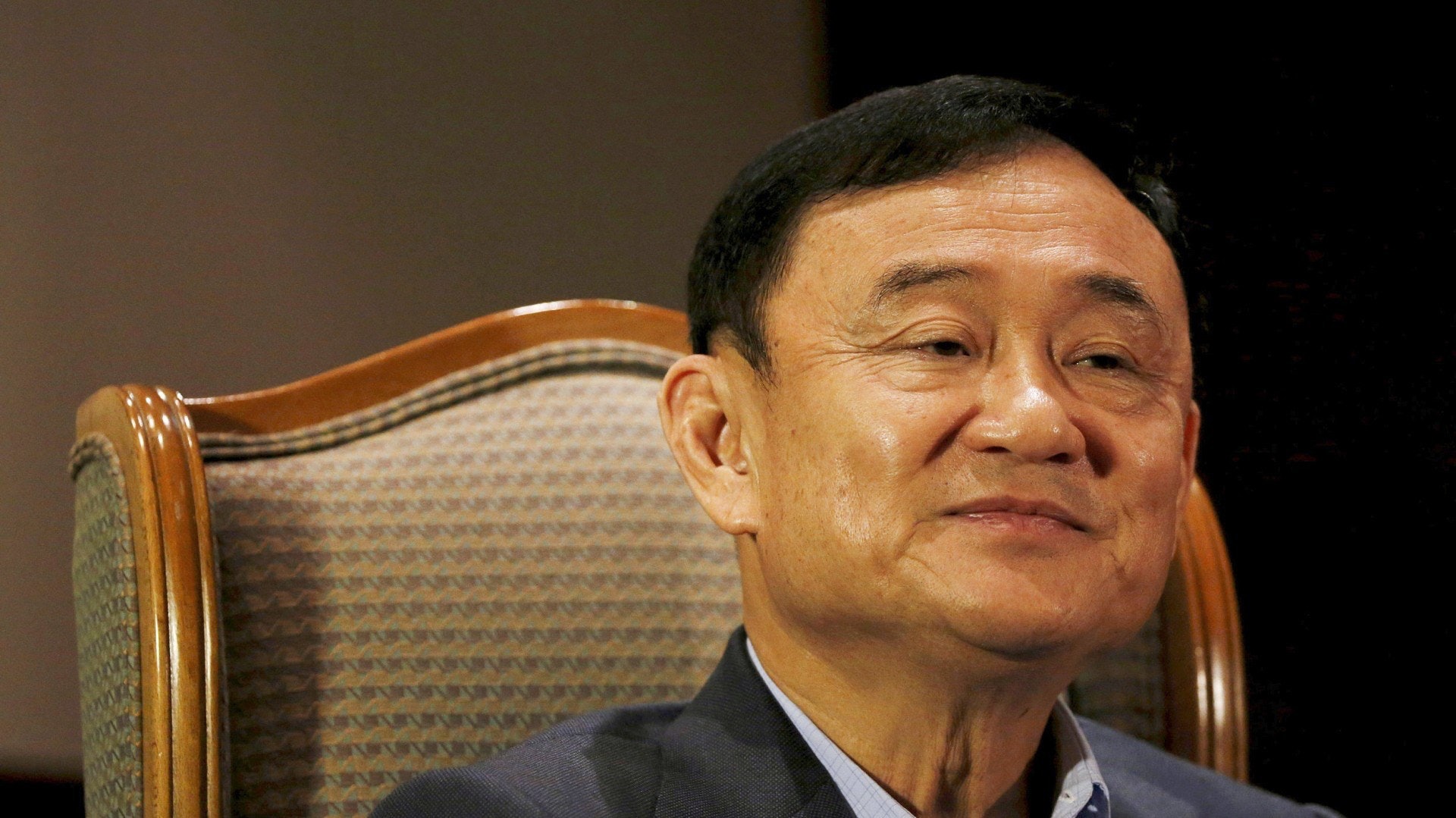 他信目前留亡海外,但他在泰國國內仍然甚孚民望。(路透社)