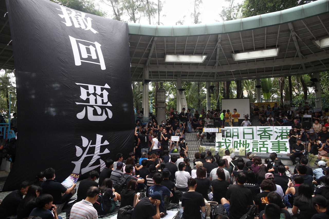 集會在卑路乍灣公園舉行。（羅君豪攝）
