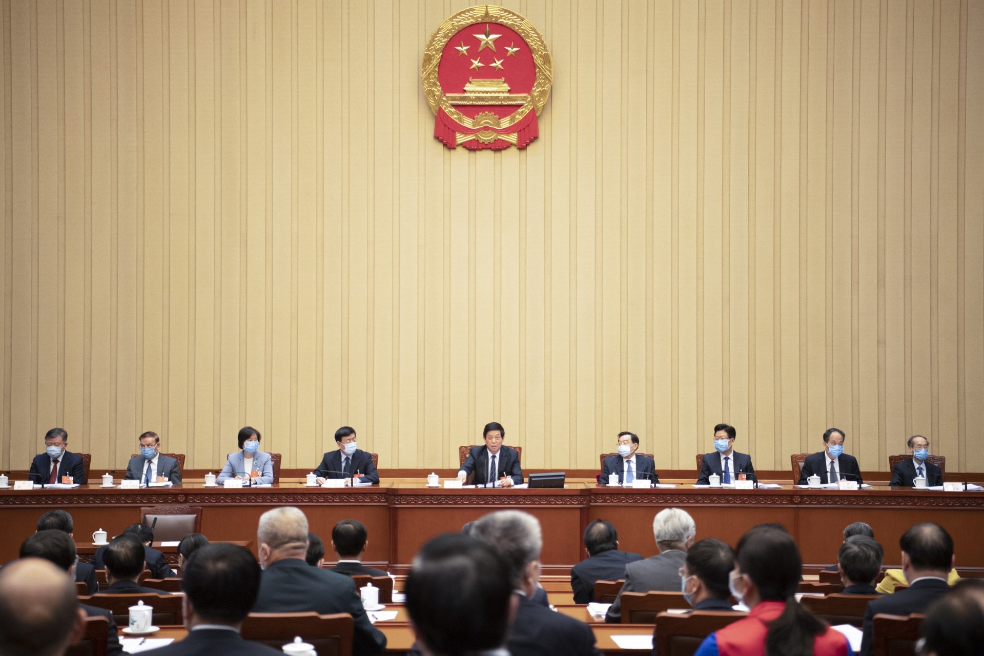 全國人大會議通過，由人大常委會制訂港版國安法。（新華社）