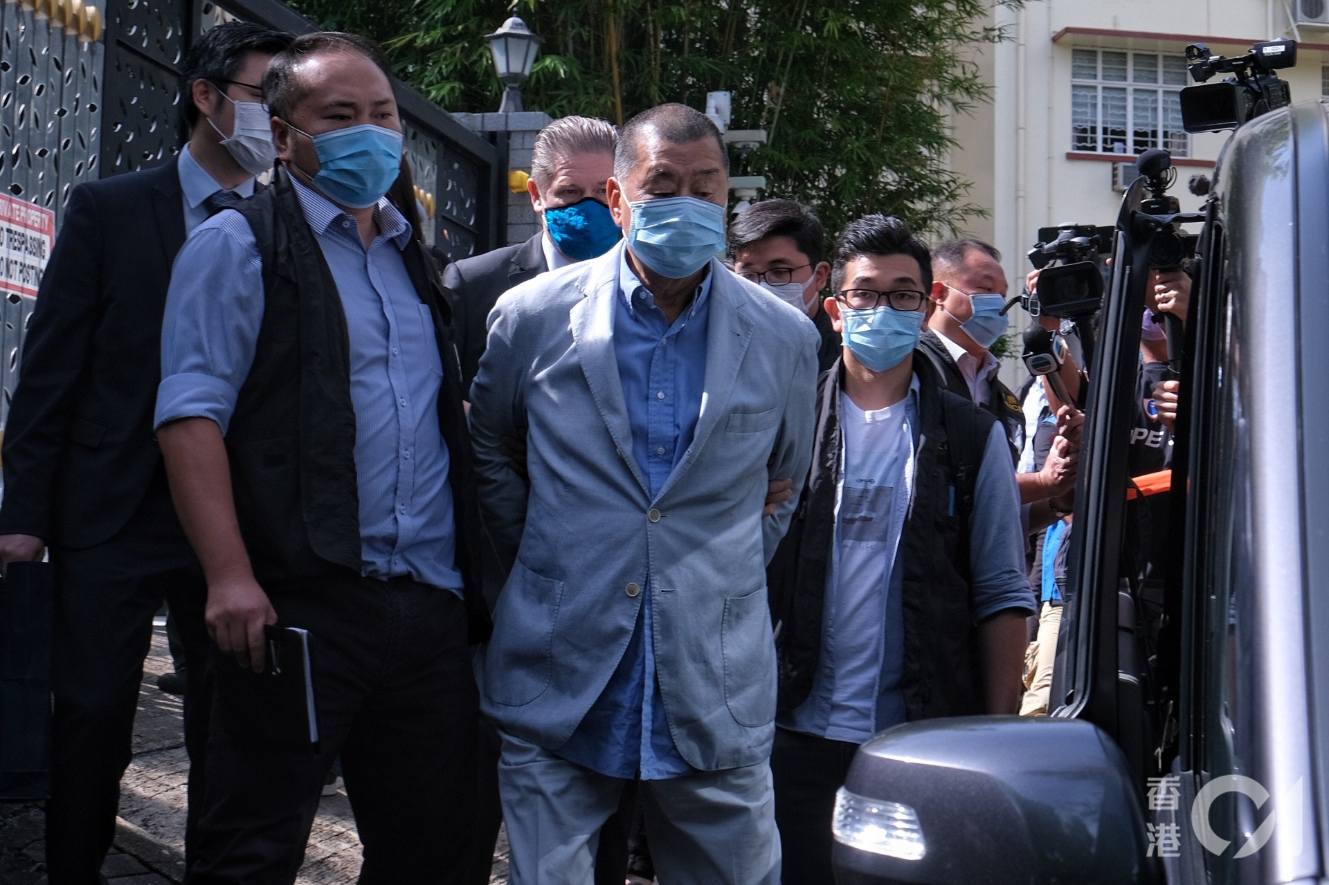 黎智英涉嫌3項罪名被捕,分別為「勾結外國或者境外勢力危害國家安全罪」、「串謀欺詐」及「煽動」。(羅君豪攝) 黎智英涉嫌3項罪名被捕,分別為「勾結外國或者境外勢力危害國家安全罪」、「串謀欺詐」及「煽動」。(羅君豪攝)