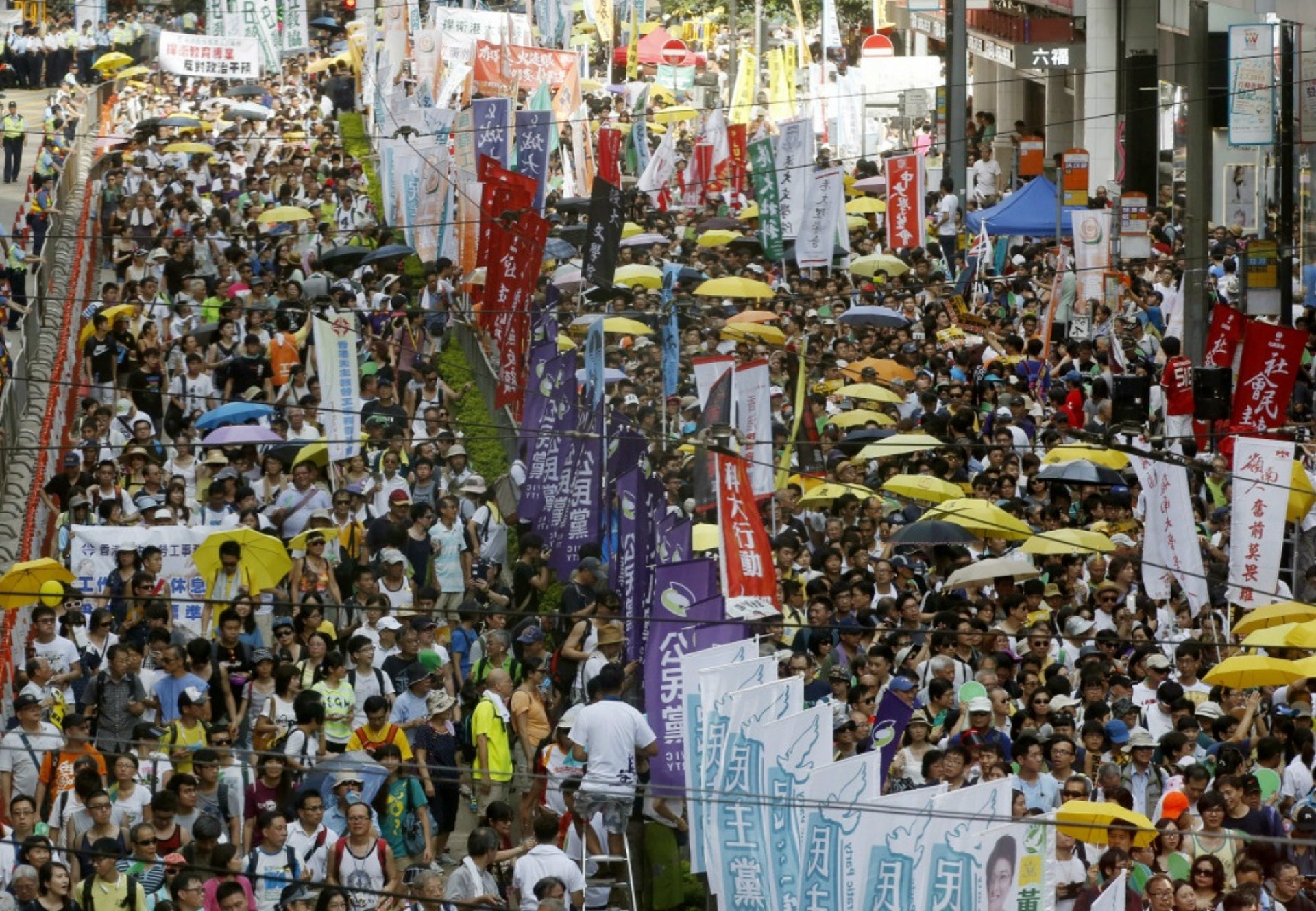 今年七一遊行將改由維園草坪出發。(資料圖片) 今年七一遊行將改由維園草坪出發。(資料圖片)