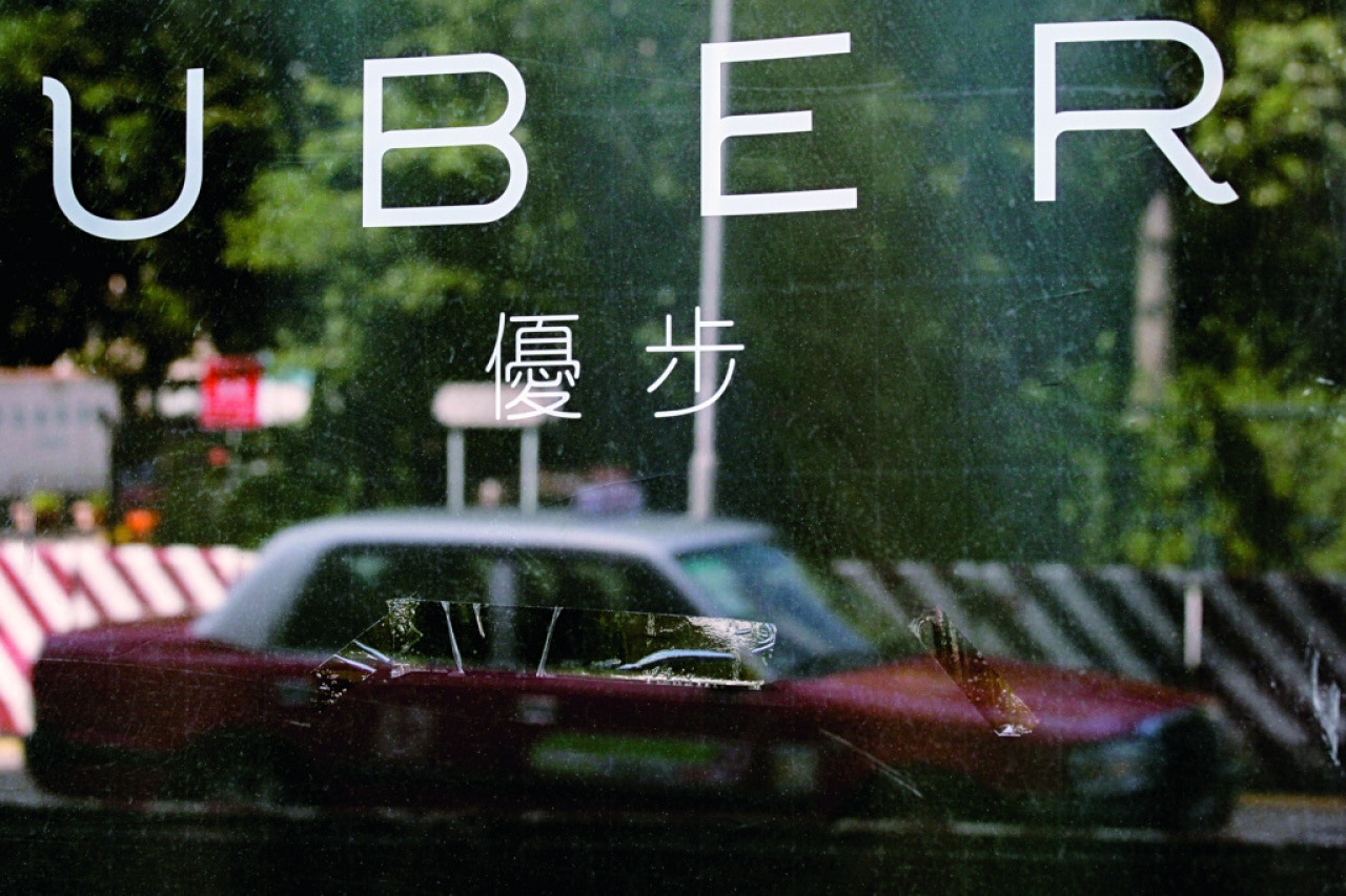 新加坡修畢課程變相Uber合法化港的士車主「先落閘」反對港跟從