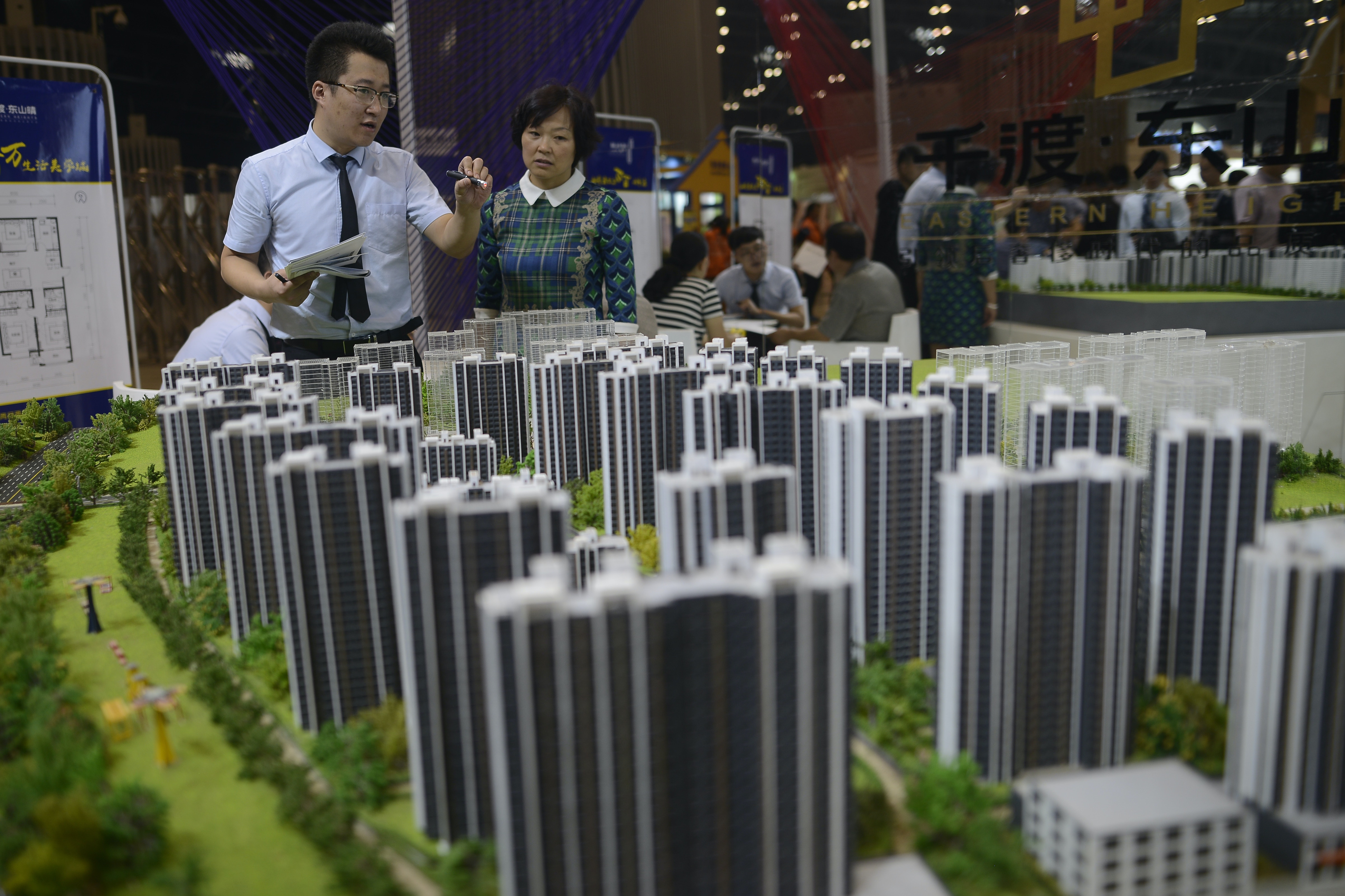 中國首9個月商品房住宅銷售按年增長11.4%，增速快過供應上升。（中新社）
