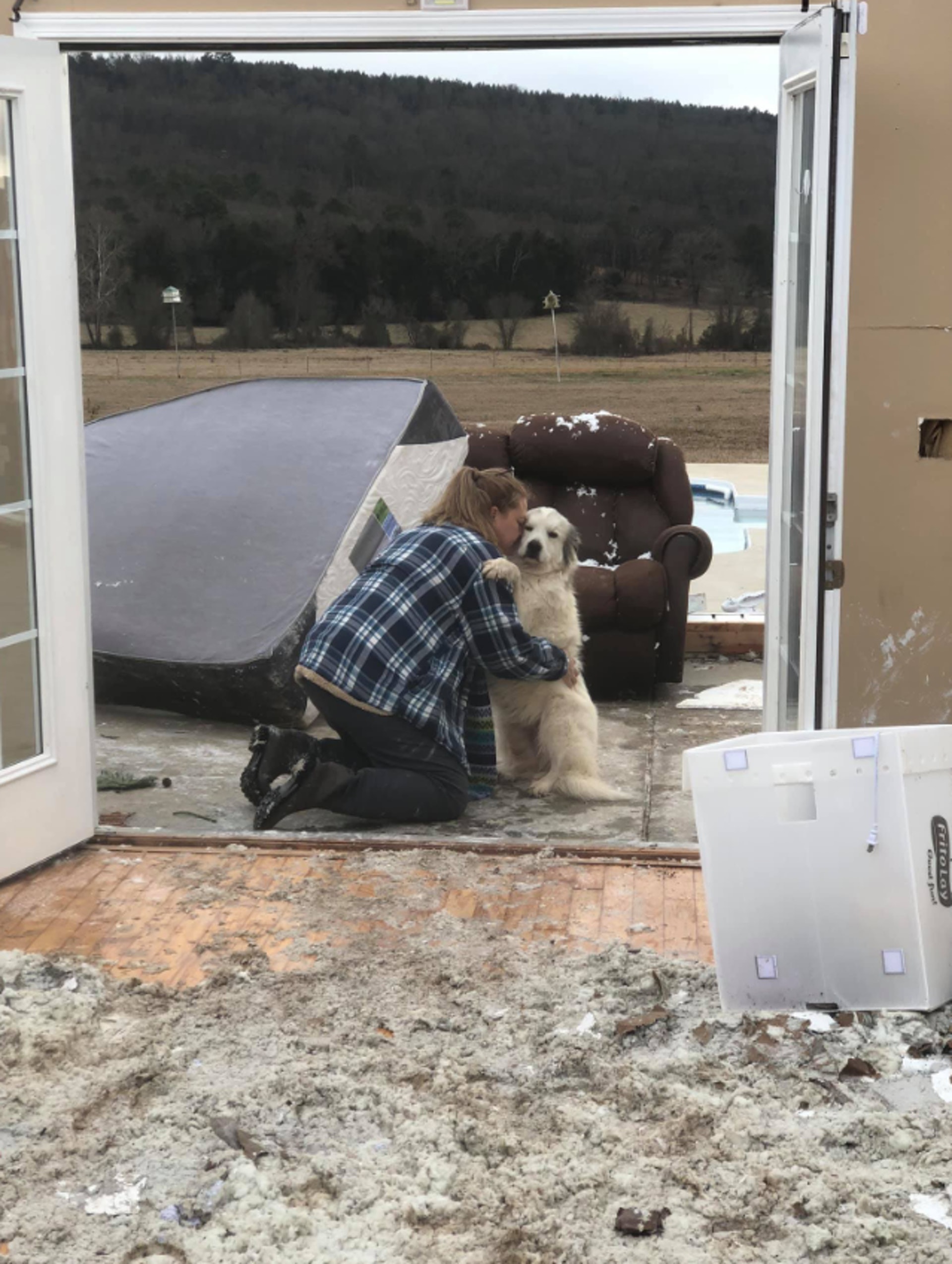 Ona saw her dog and hugged it excitedly. (Julie Moore) Ona saw her dog and hugged it excitedly. (Julie Moore)