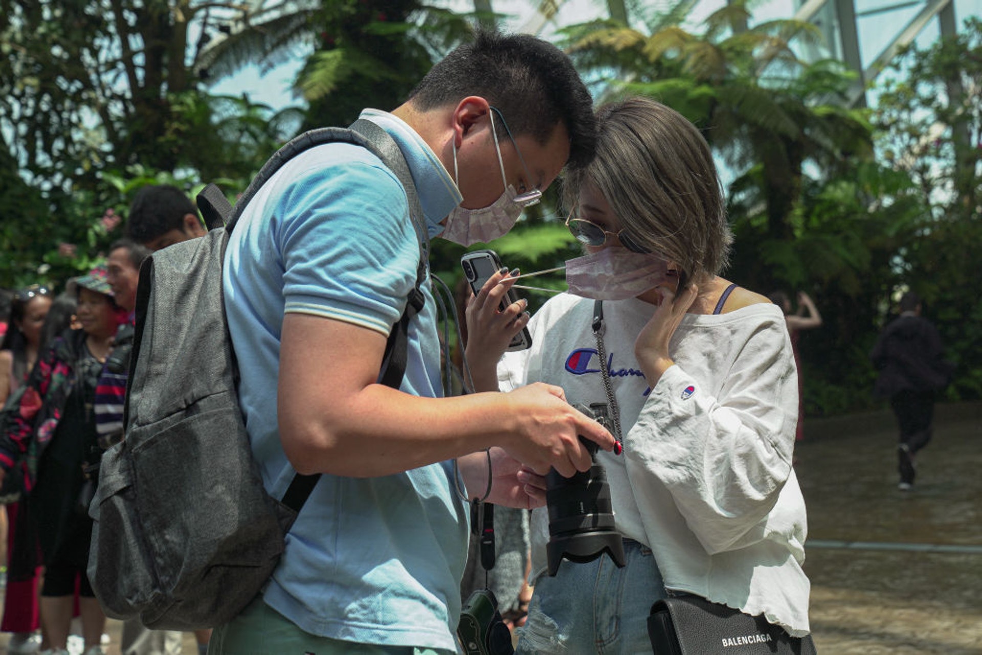 新加坡政府1月31日宣布新的抗疫措施,圖為到訪新加坡的民眾(Getty) 新加坡政府1月31日宣布新的抗疫措施,圖為到訪新加坡的民眾(Getty)