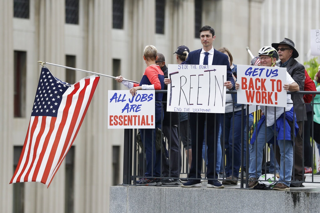 不是示威者的訴求都是要求回到工作崗位,維持生計。(美聯社) 不是示威者的訴求都是要求回到工作崗位,維持生計。(美聯社)