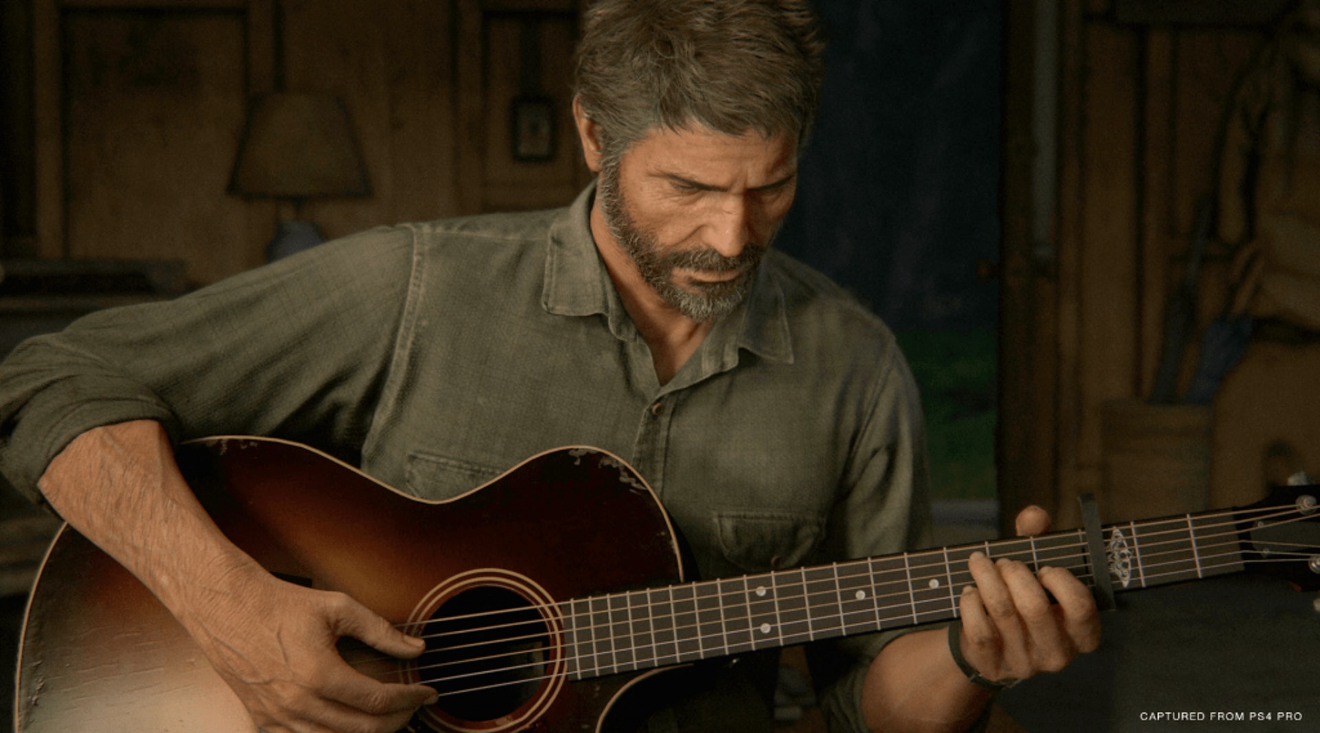 《The Last of Us》遊戲中大叔Joel透過這支結他,教導小女孩Ellie音樂,並建立兩人不分分割的羈絆。 (圖片來源:遊戲截圖) 《The Last of Us》遊戲中大叔Joel透過這支結他,教導小女孩Ellie音樂,並建立兩人不分分割的羈絆。 (圖片來源:遊戲截圖)