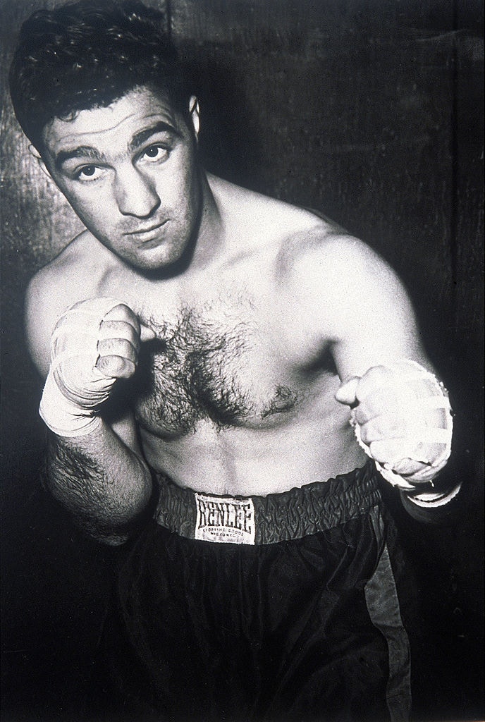 拳擊史上唯一全勝的重量級拳王rocky Marciano 曾與阿里夢幻對決