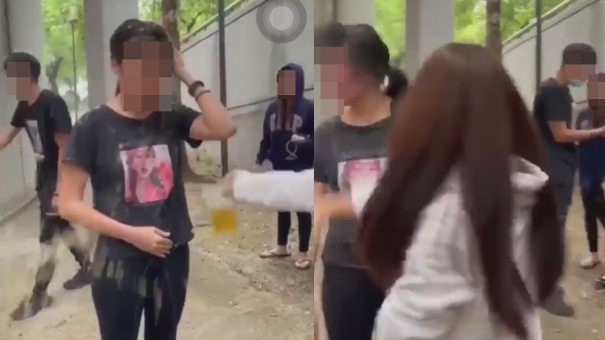 台灣高雄1段影片在網絡瘋傳，只見1名少女被7人包圍淋飲料，短短56秒的影片中遭甩9巴掌，其他圍觀者更在嘻笑。（影片截圖）