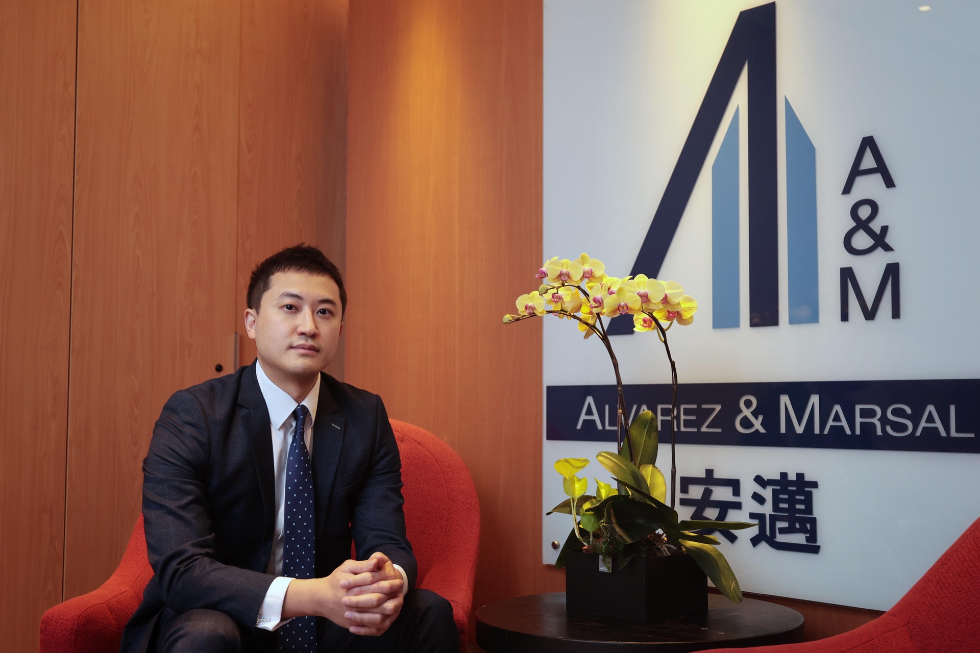 安邁企業諮詢高級董事羅嘉稱,疫情影響了核數師的工作進度。(李澤彤攝) 安邁企業諮詢高級董事羅嘉稱,疫情影響了核數師的工作進度。(李澤彤攝)