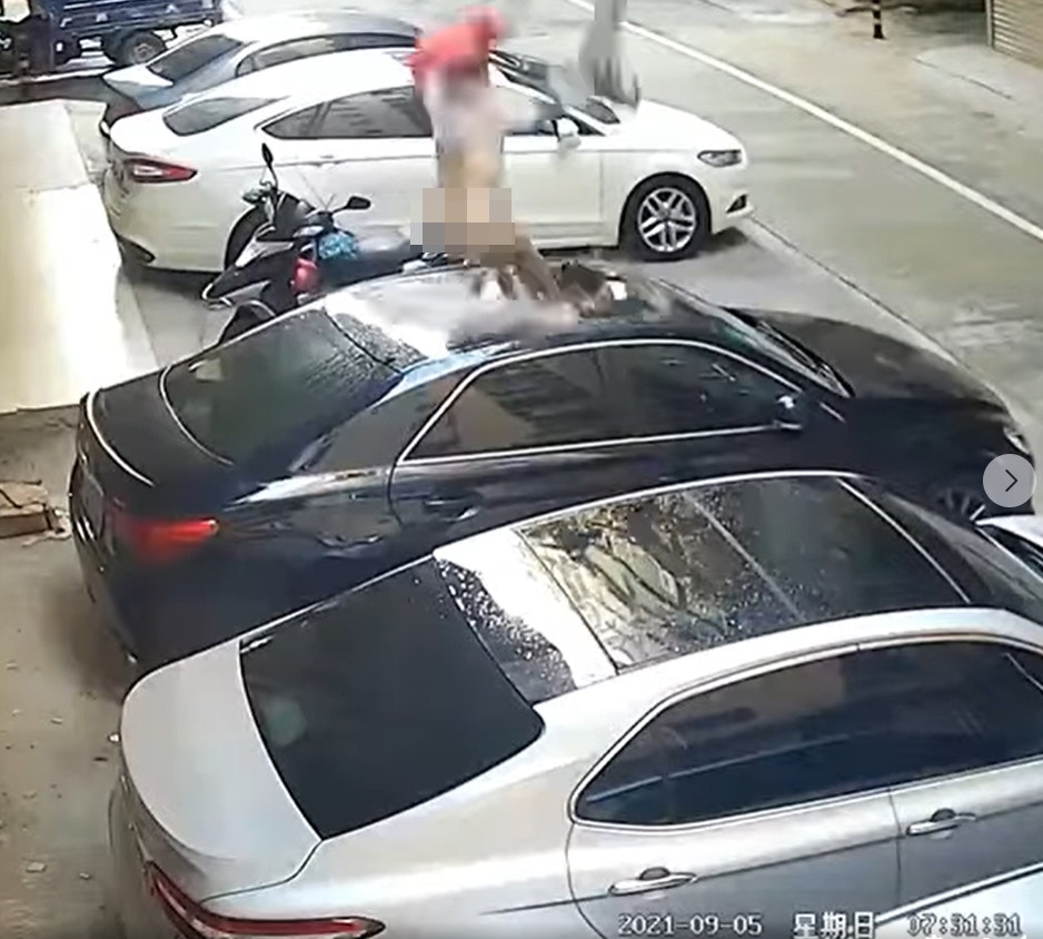 內褲女墮樓壓穿車頂半裸男衝至擁吻安慰網民 激情時刻出事