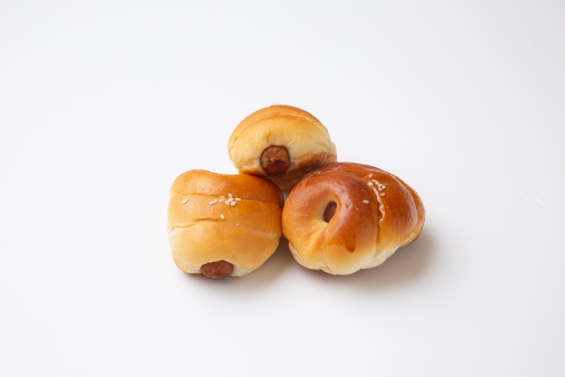 腸仔包與菠蘿包是最不被建議的第一位早餐之選。(資料圖片) 腸仔包與菠蘿包是最不被建議的第一位早餐之選。(資料圖片)