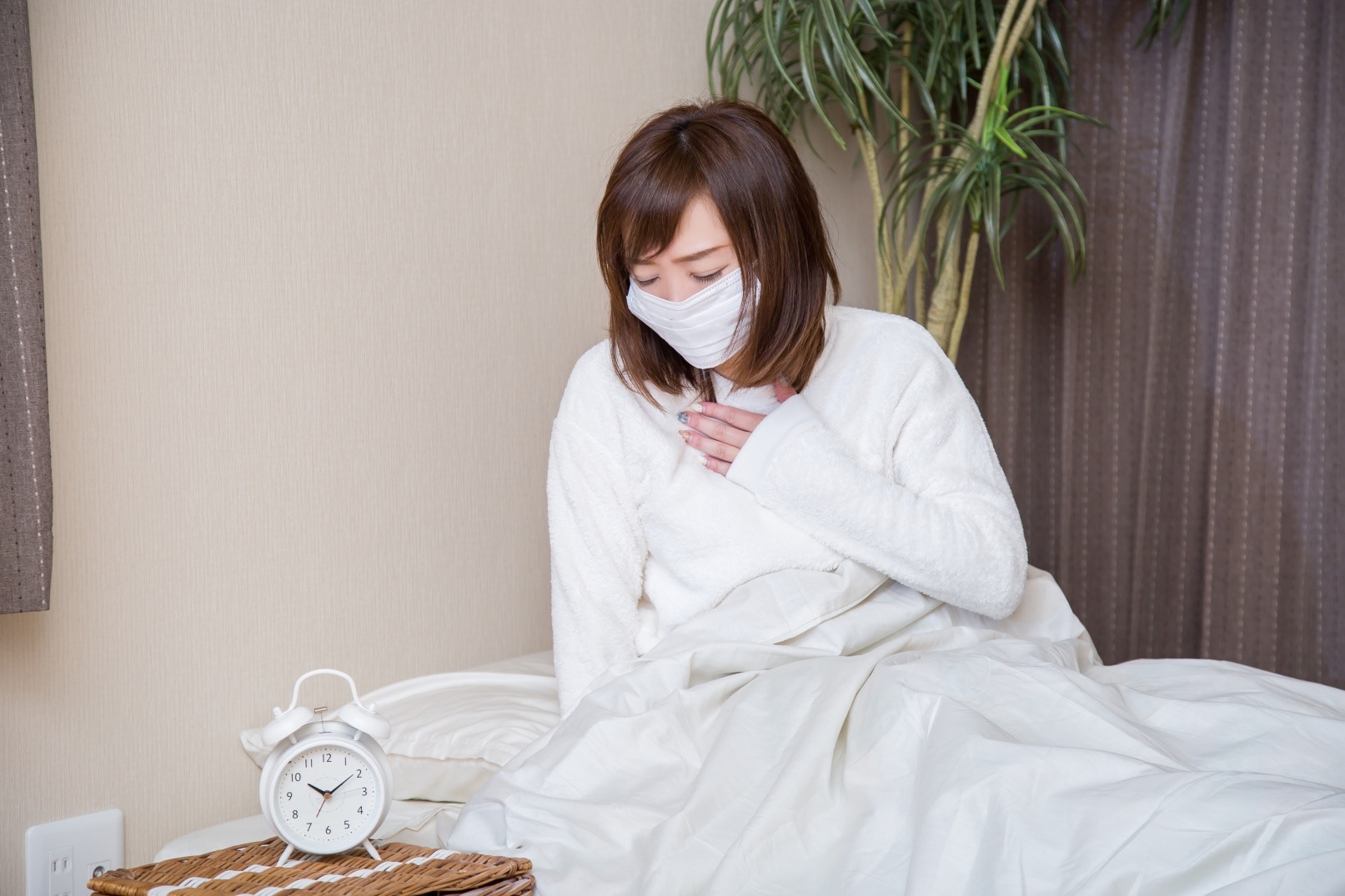 氣喘是新冠肺炎後遺症，即「長新冠」的症狀之一。(Shutterstock)