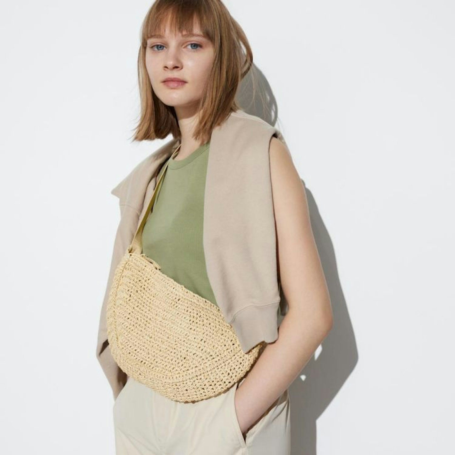 UNIQLO 弧形迷你編織肩背包(Source:UNIQLO) UNIQLO 弧形迷你編織肩背包(Source:UNIQLO)