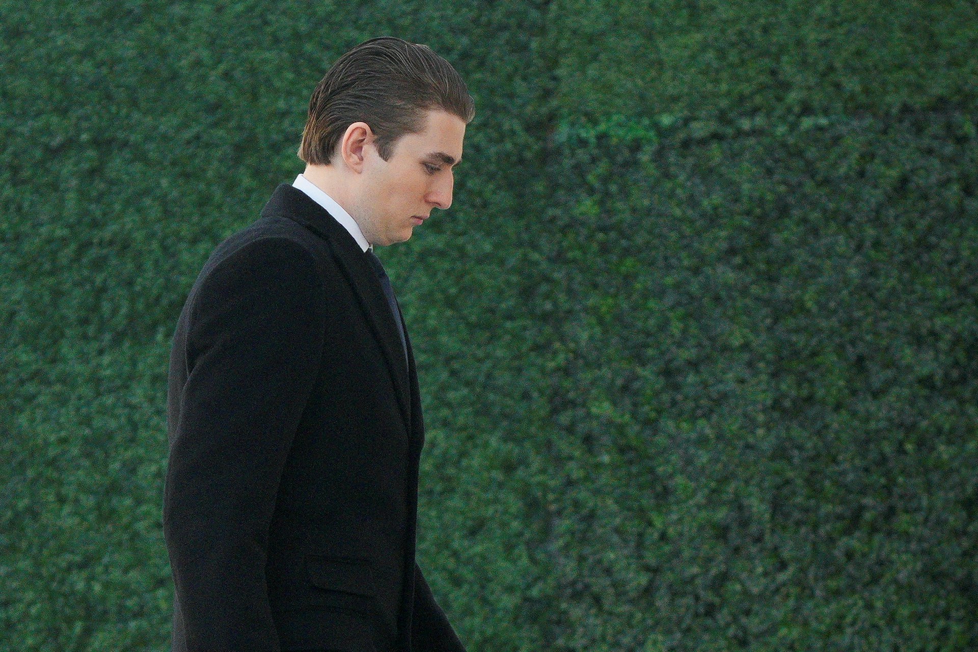 特朗普幼子巴倫(Barron Trump)2025年1月20日早上出席總統就職禮前的教堂祈禱儀式(Reuters)