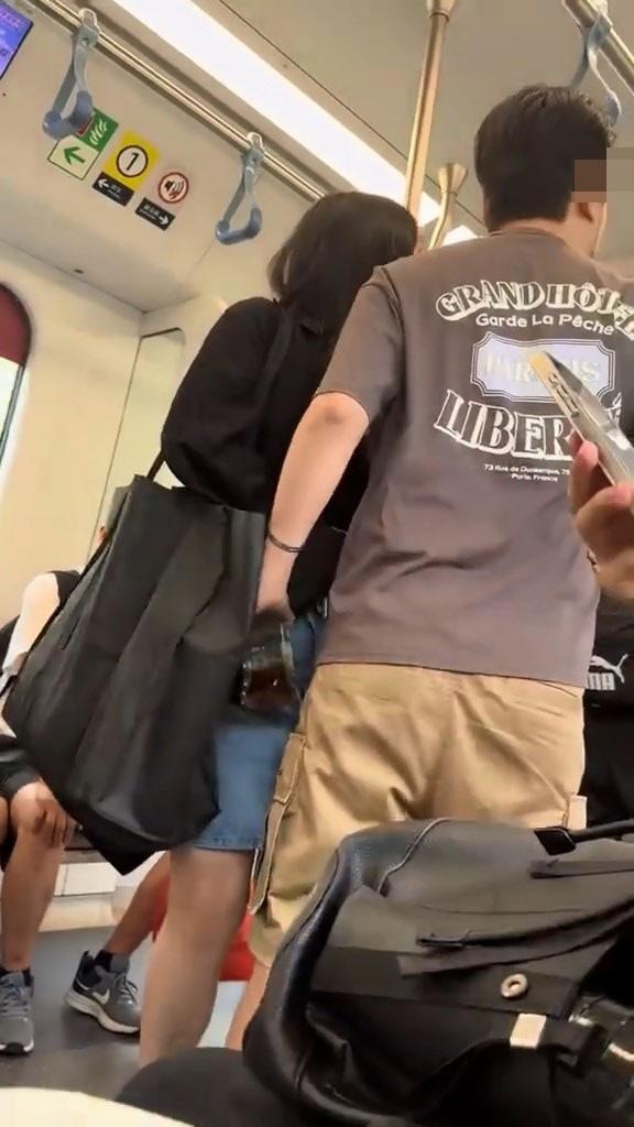 本港網絡瘋傳1段影片，指港鐵東鐵線列車內，有後生仔與阿伯因事爭吵「爆粗互兇」挑釁。（影片截圖）