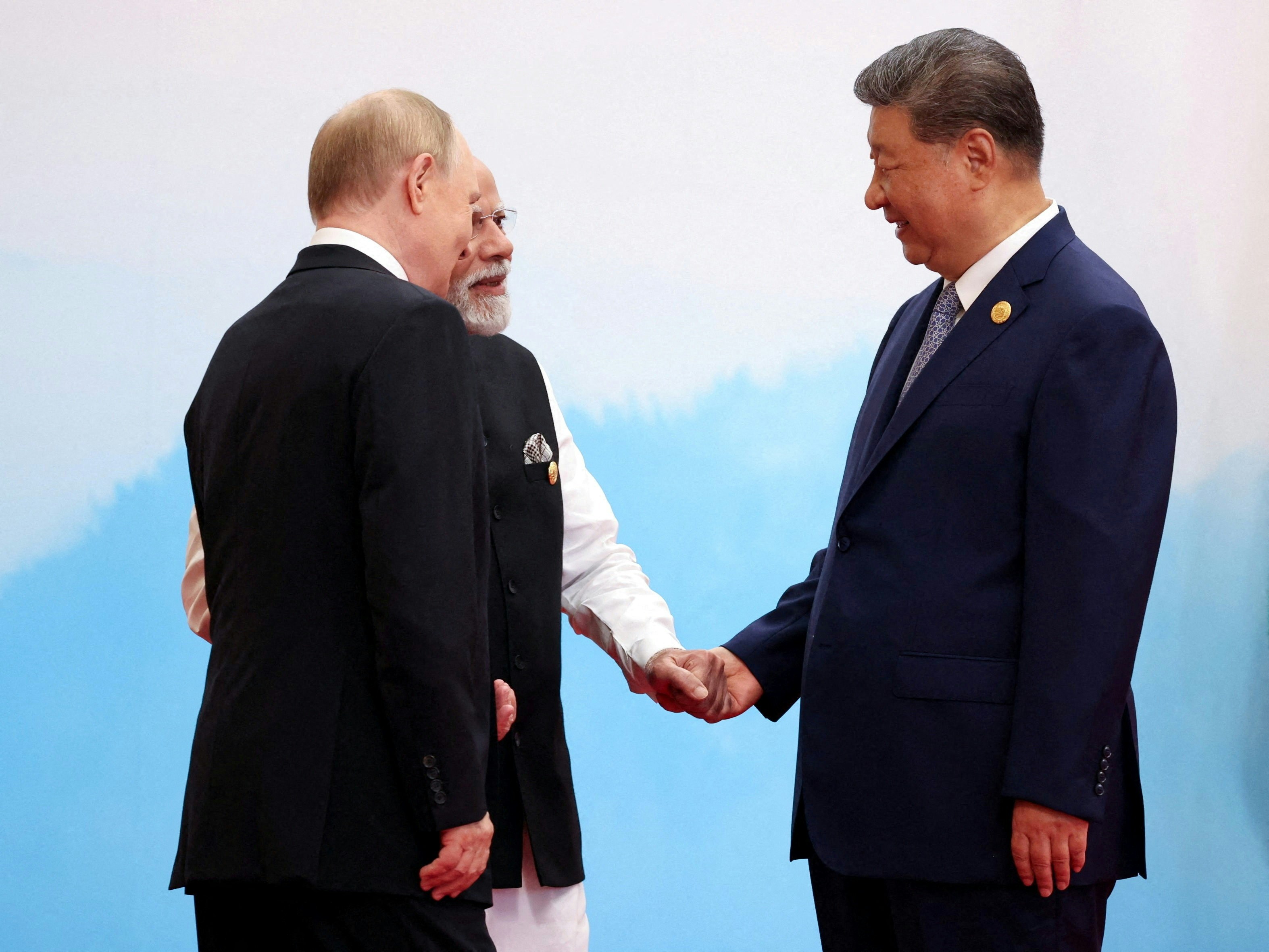 ϯƽ_˹yվVladimir PutingնͤcӡȿĪϣNarendra ModiAՄgĪ߀ͬrŶ˵֡(Reuters)
