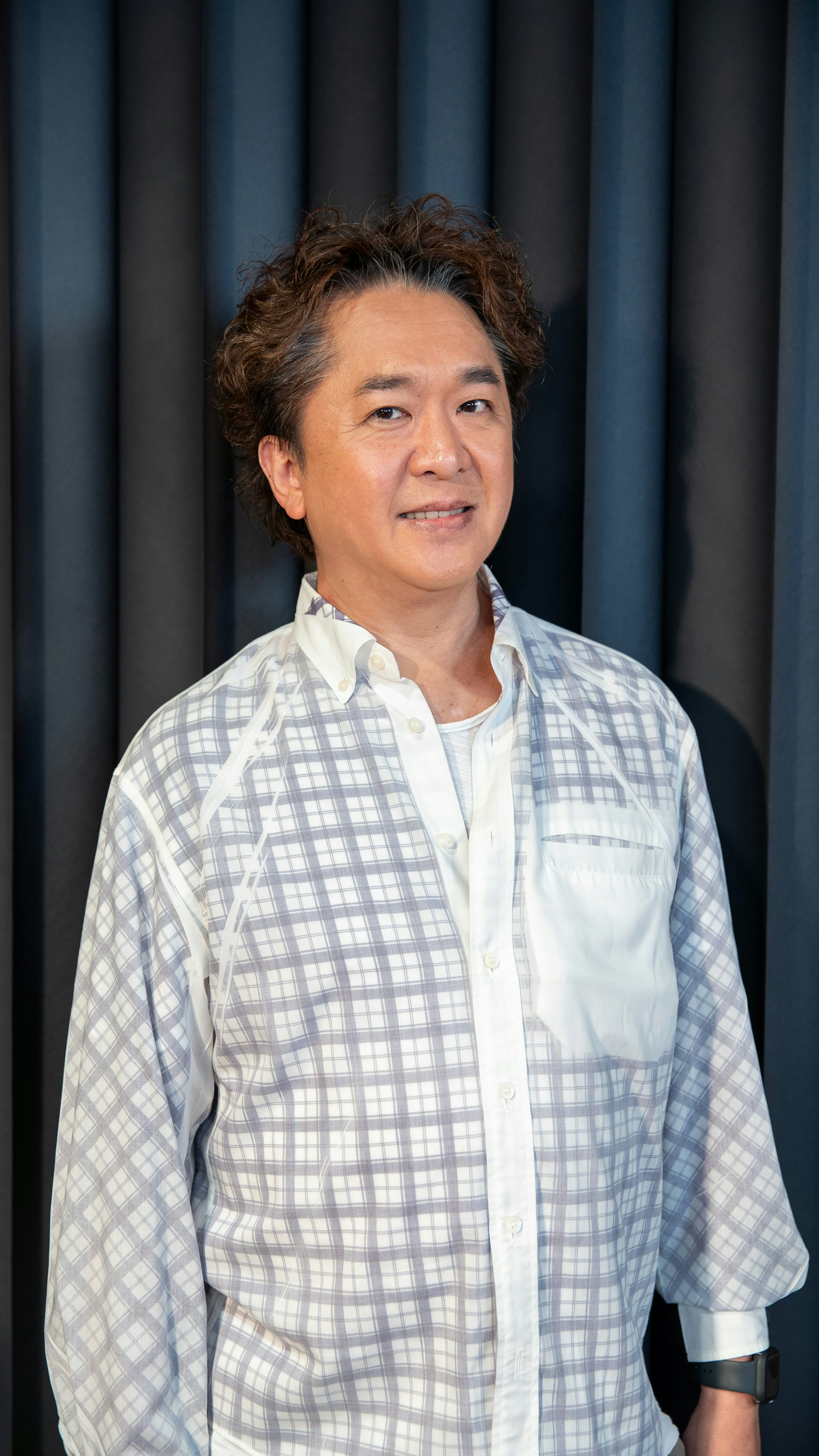 邓兆尊。