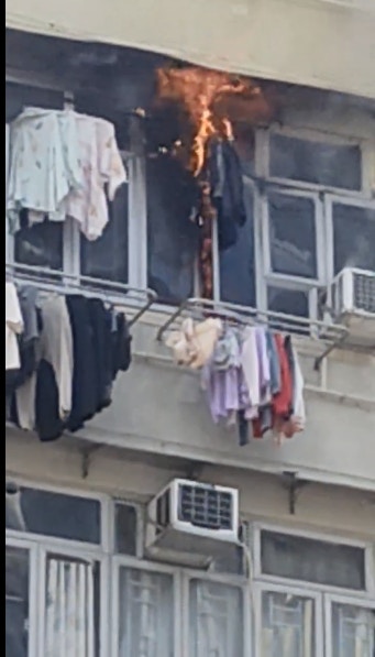 旺角山東街71號唐樓天台起火，多人目擊報案。（網民Peter Wong影片截圖）