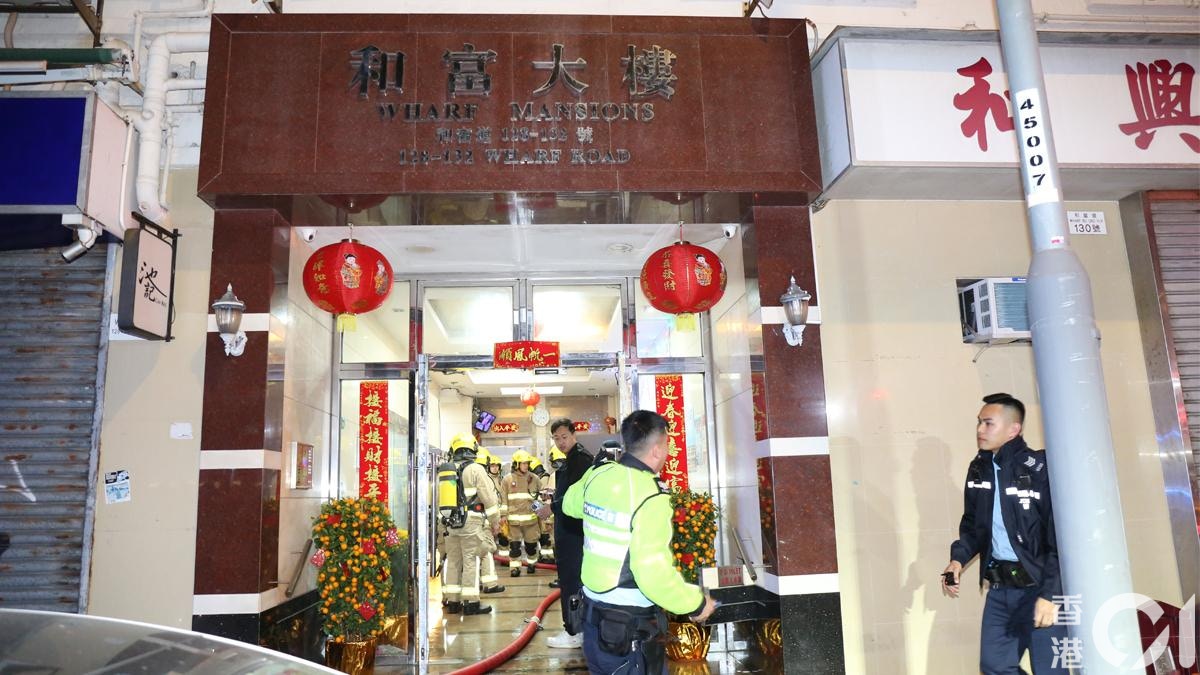 北角劏房疑拖板短路起火　消防開喉撲熄　男住戶頭暈送院30人疏散