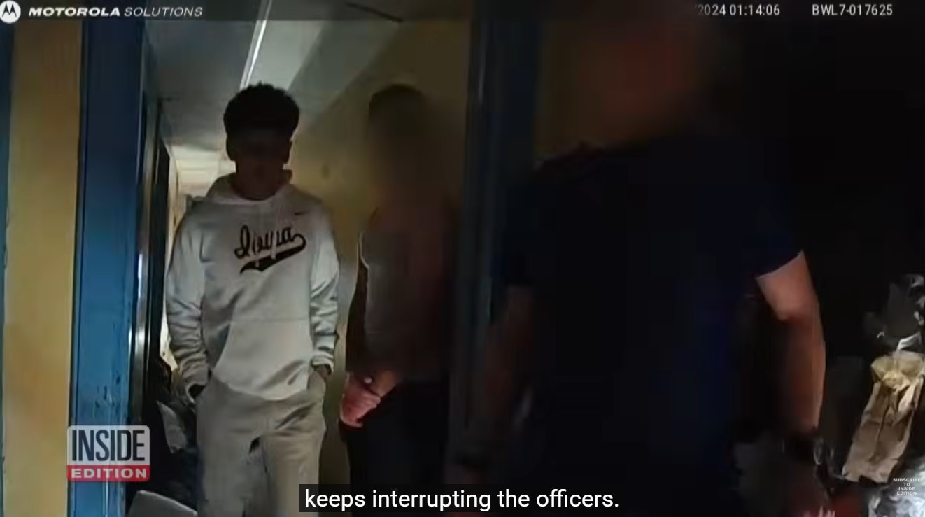 一名22岁男子在警方调查过程中,饮饮料,不配合调查。(YouTube@Inside Edition)