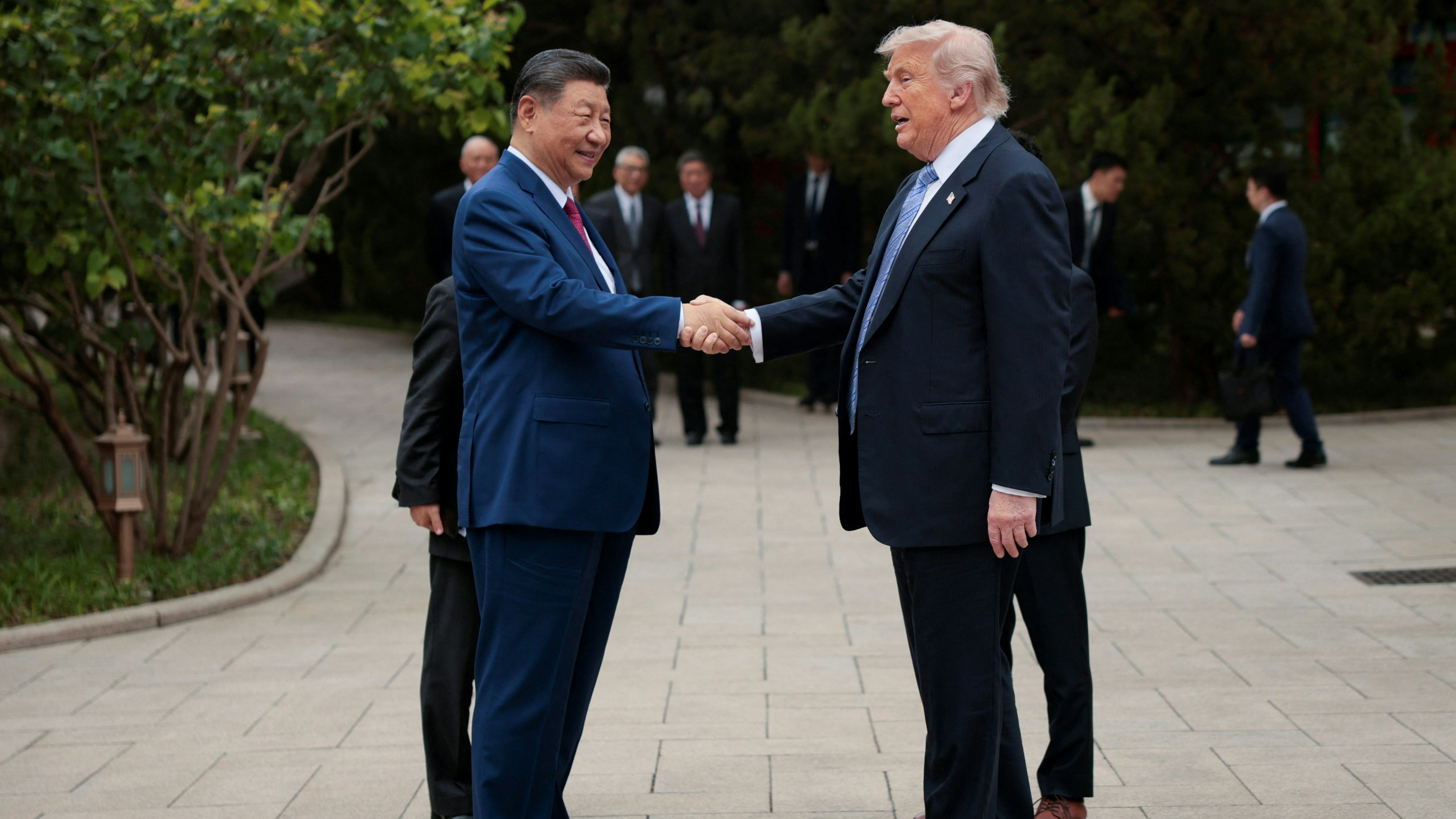 On May 15, 2026, at Zhongnanhai Garden in Beijing, Chinese President Xi Jinping (left) shakes hands with visiting US President Donald Trump (right) after his visit. (Reuters)