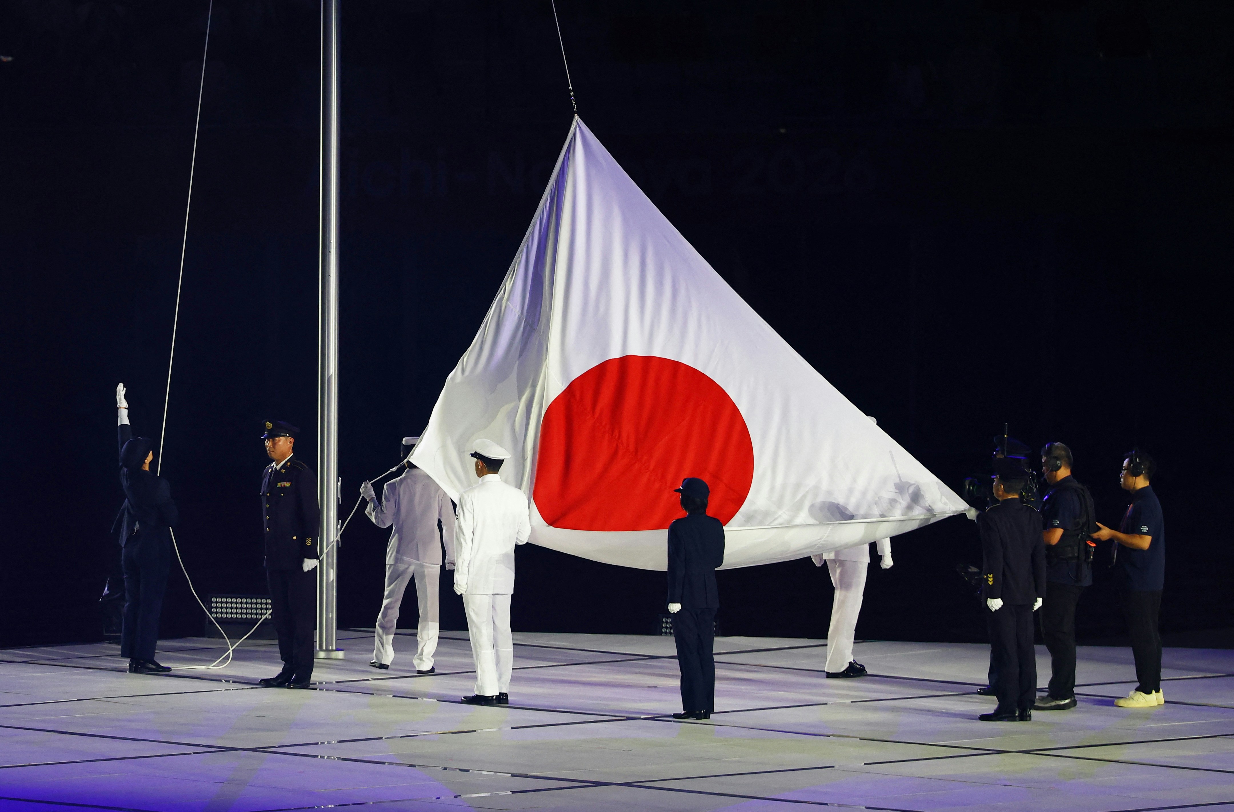 2026年9月19日，名古屋亚运开幕礼，仪式一开始先升日本国旗。（Reuters）