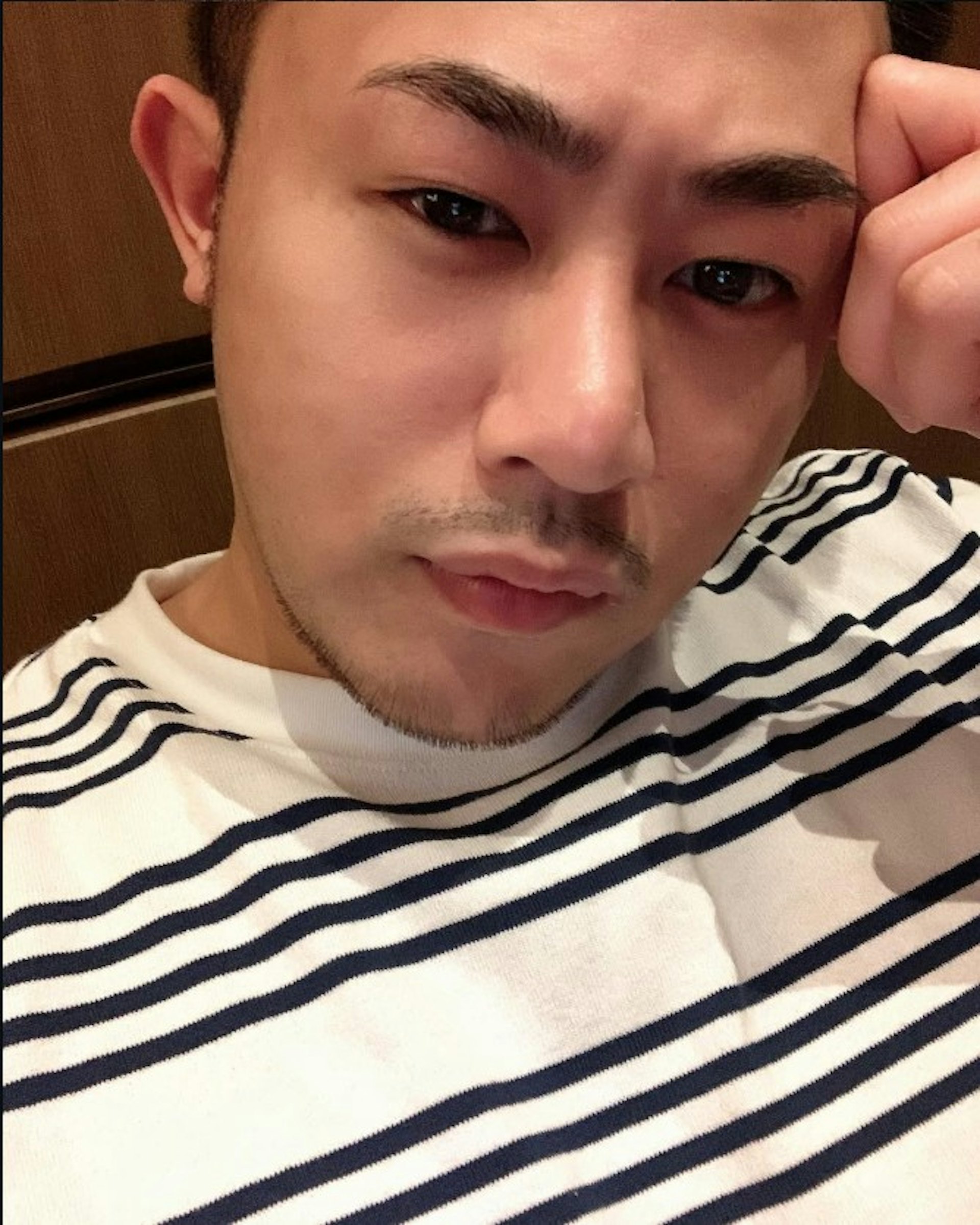 首被告鄺港傑曾在案發前5次到龍尾村的單位。