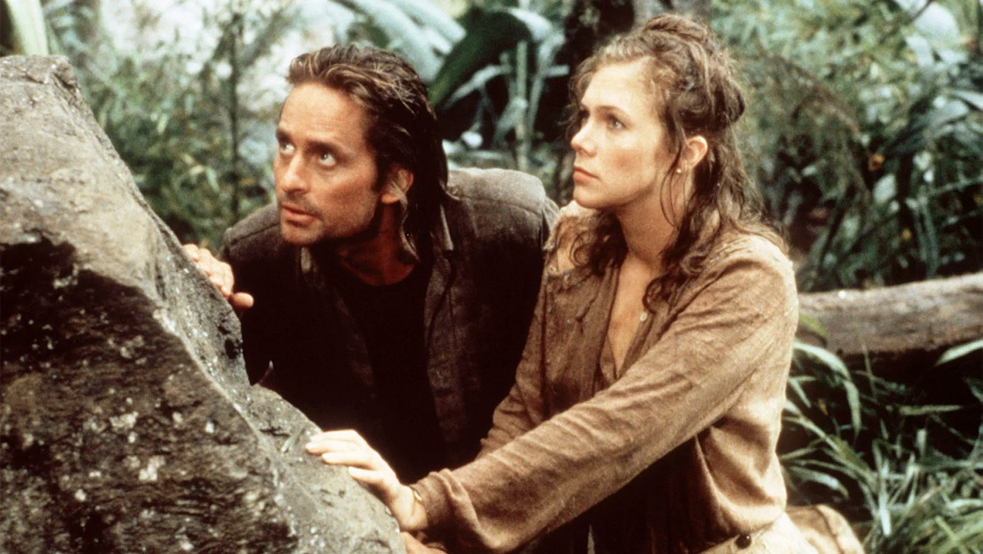 米高德格拉斯(Michael Douglas)與凱薩琳透納(Kathleen Turner)主演的《通天小子俏嬌娃》。(《Romancing the Stone》劇照)